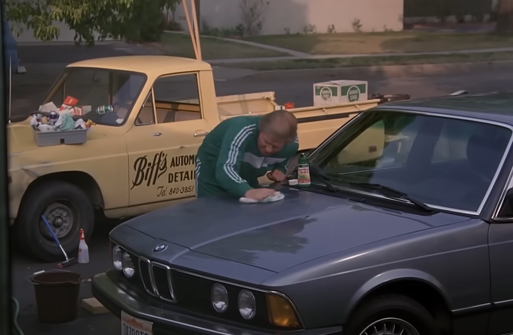 Biff washes a car in Back to the Future